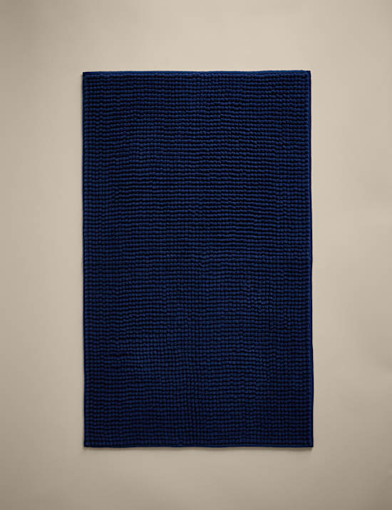 Tapis de bain &agrave; pompons