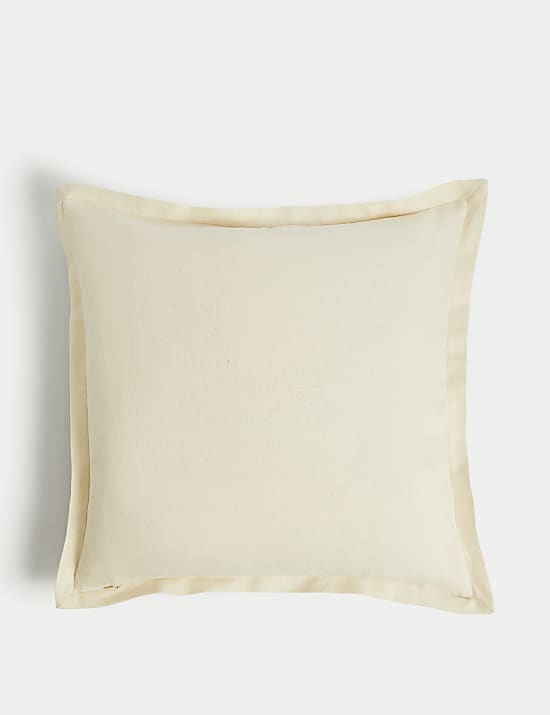 Coussin en coton et lin à motif brodé