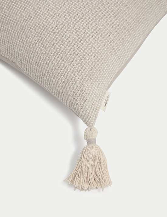 Coussin 100 % coton &agrave; motif textur&eacute; et pampilles