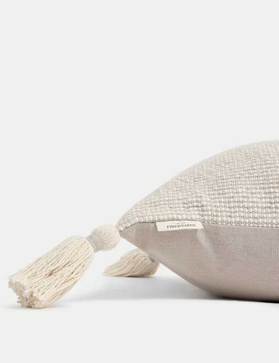 Coussin 100 % coton &agrave; motif textur&eacute; et pampilles