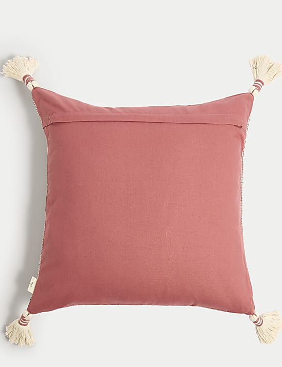 Cojín 100% algodón texturizado con borlas