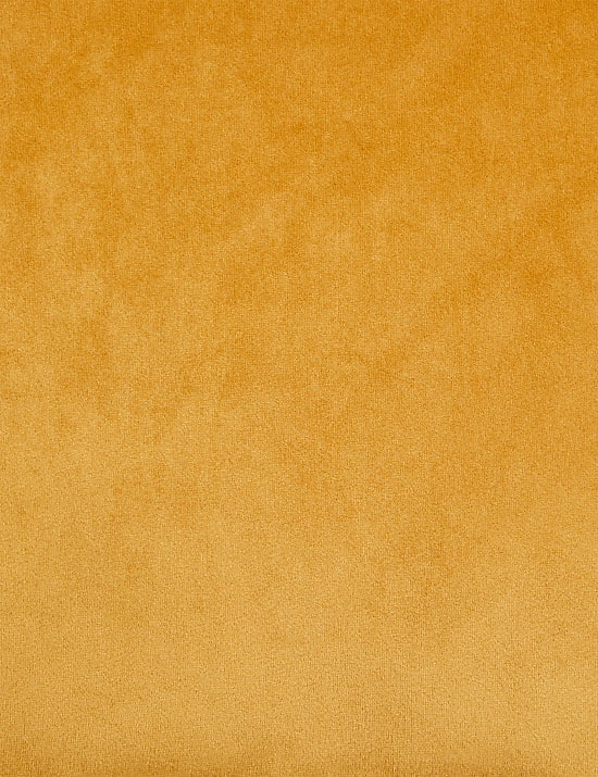 Grand coussin en velours à passepoil