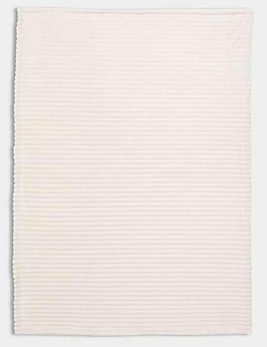 Plaid en polaire c&ocirc;tel&eacute;e