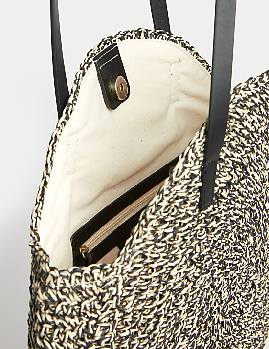 Bolso de hombro de paja redondo