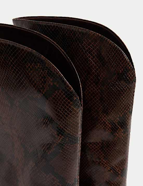 Kniehoge rijlaarzen met blokhak en slangenprint
