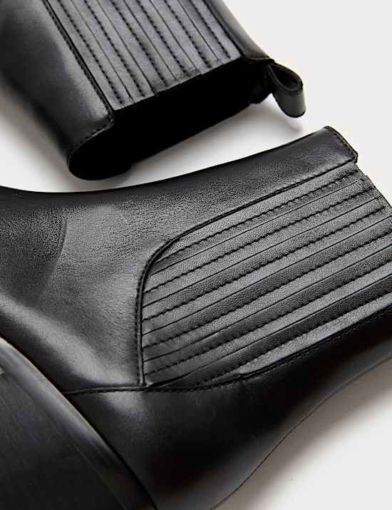 Leren cowboylaarzen tot de enkel met blokhak en spitse neus