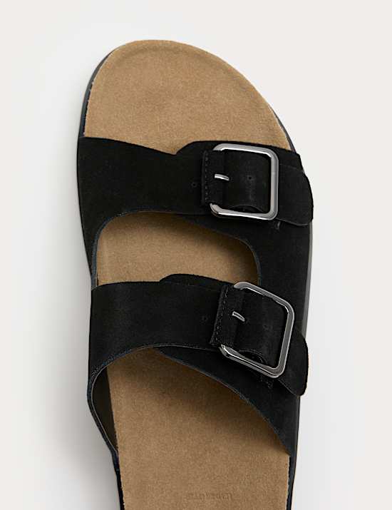 Mules en daim &agrave; assise plantaire et double boucle