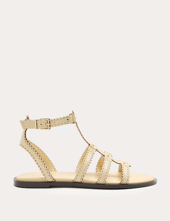 Spartiates plates en cuir &agrave; bord festonn&eacute;