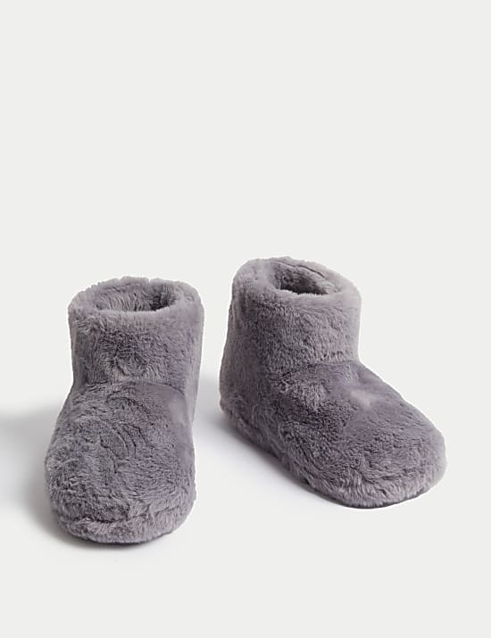 Zapatillas tipo bota imitaci&oacute;n de piel