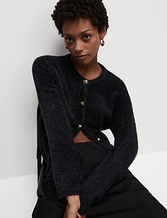 Metallic vest met knoopsluiting en ronde hals