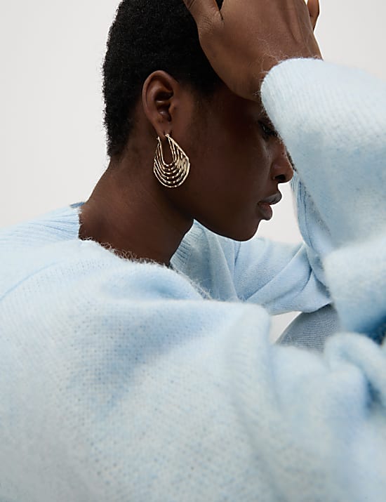 Ontspannen trui met boothals en alpacawol