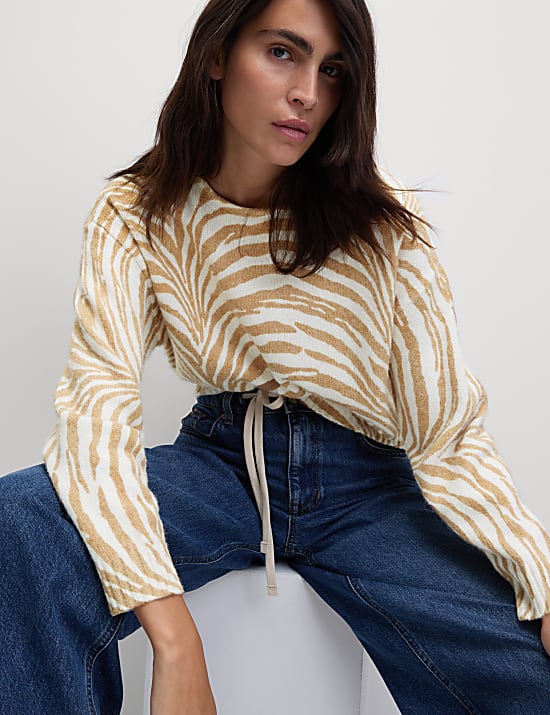 Su&eacute;ter informal de lana de canal&eacute; con estampado animal