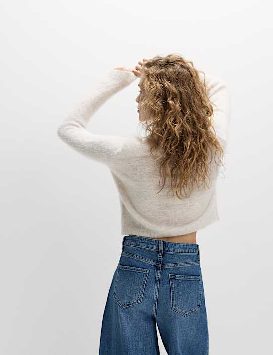 Kort, gebreid vest van een alpacablend met knoopsluiting