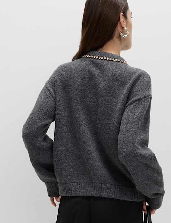 Ζακέτα με μαλλί με στρογγυλή λαιμόκοψη και λεπτομέρεια με πετράδια