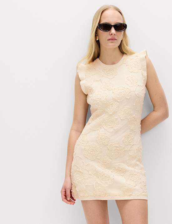 Robe coupe courte en maille &agrave; motif fleuri textur&eacute;