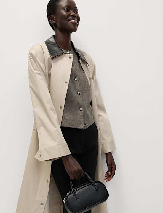 Cárdigan corto de manga corta de hilo aireado con botonadura delantera