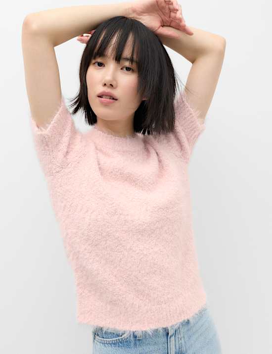 Top de punto texturizado con cuello redondo y corte slim