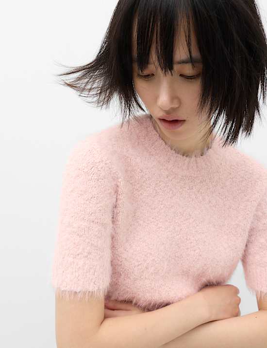 Top de punto texturizado con cuello redondo y corte slim
