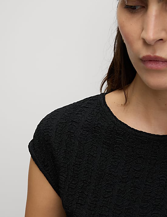 Top &agrave; manches courtes et motif textur&eacute;