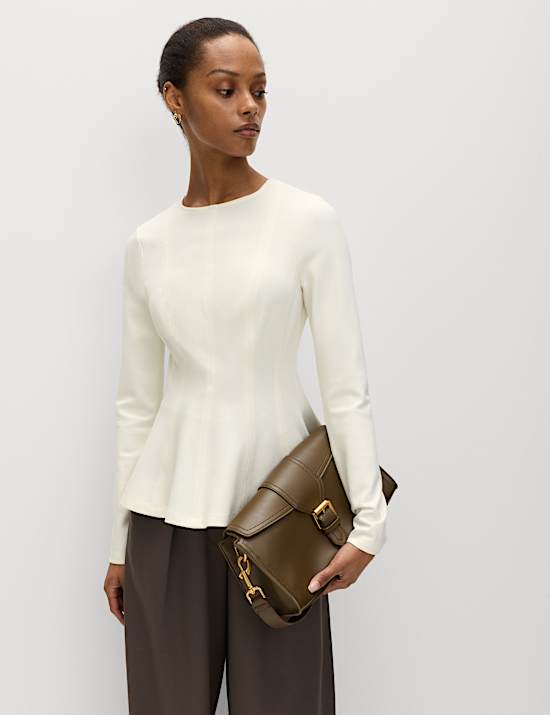 Getailleerde top met lange mouwen en peplum