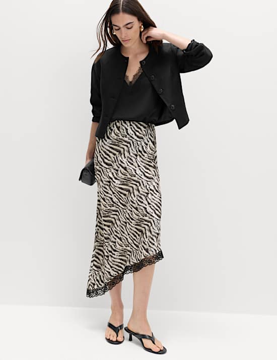 Asymmetrischer Midi-Rock mit Zebraprint und Spitzensaum