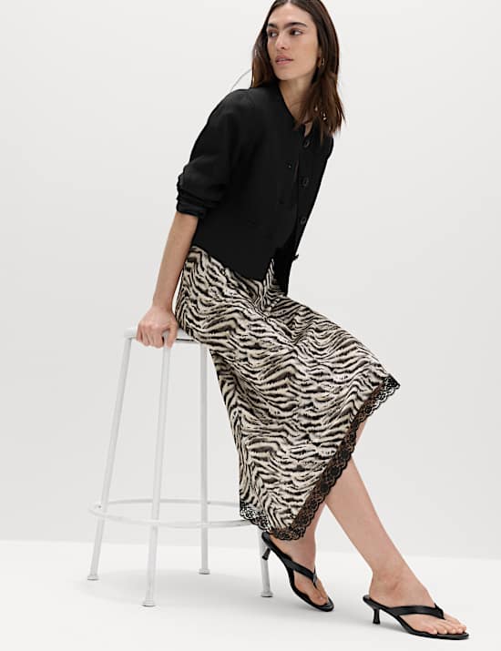 Asymmetrischer Midi-Rock mit Zebraprint und Spitzensaum