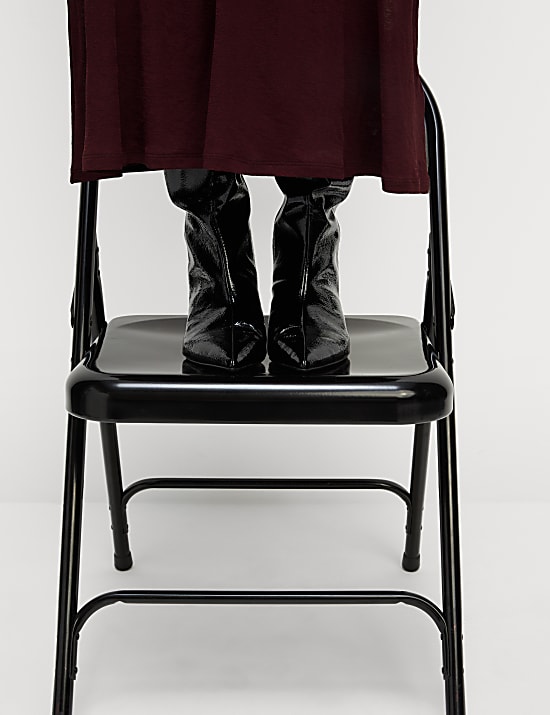 שמלת ג'רסי באורך מידי מבד מש ובגזרה ישרה וצמודה