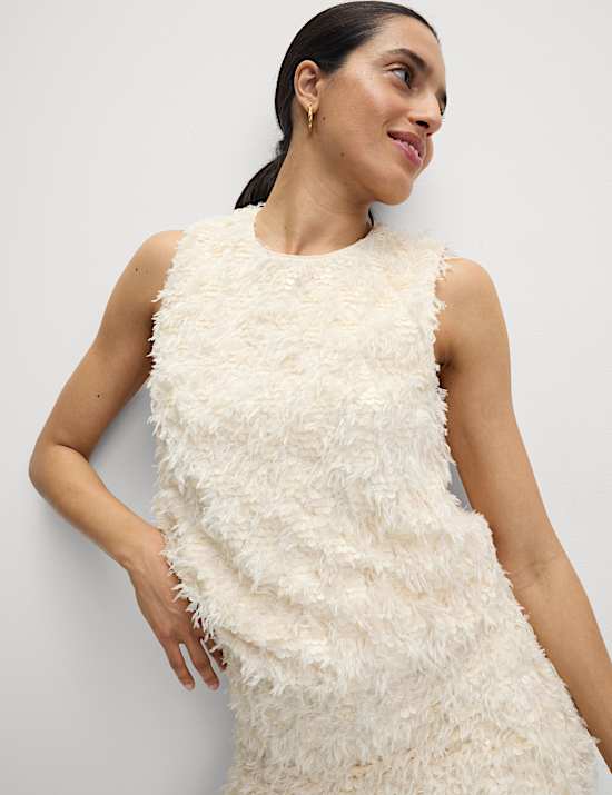 Top versierd met verendetail