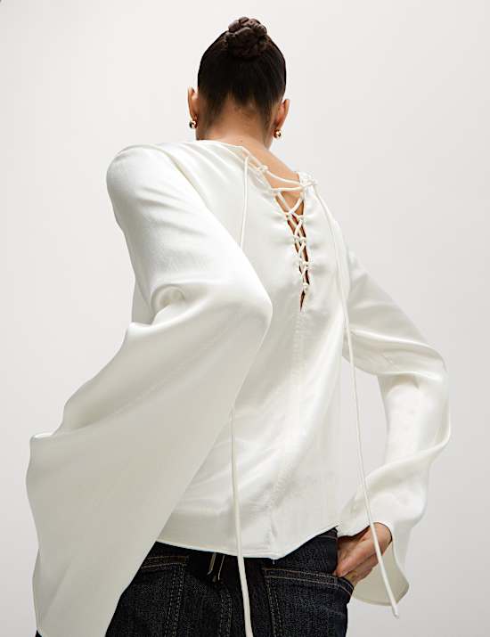 Top met lange mouwen en strikdetail