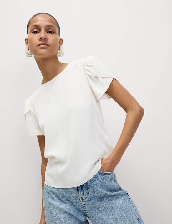 Top à manches bouffantes