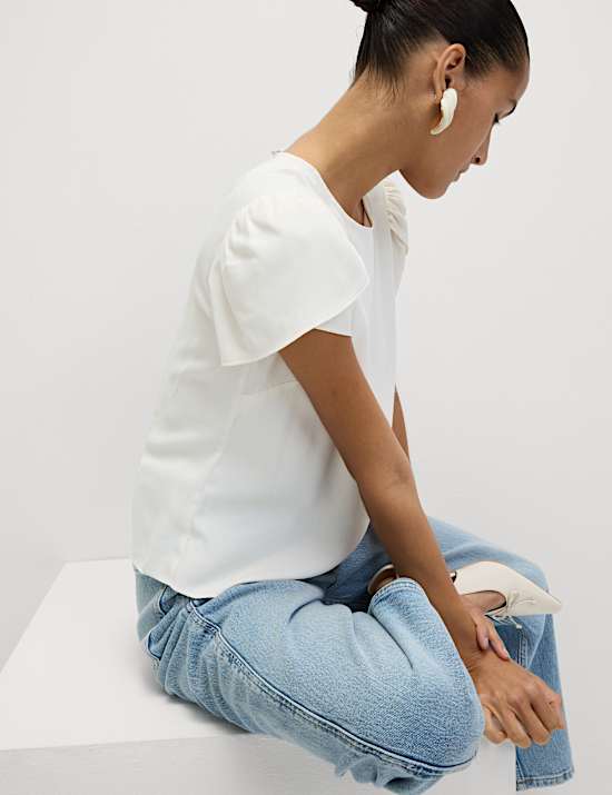 Top à manches bouffantes