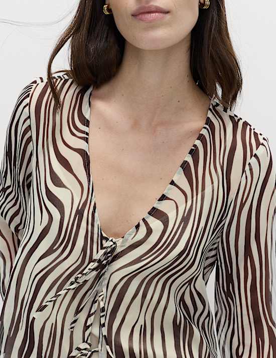 Zebra Print Tie Front Flute Sleeve Blouse