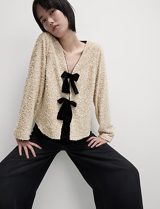 Blouse met V-hals en lovertjes