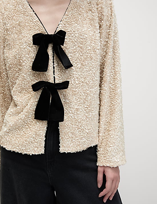 Blouse met V-hals en lovertjes