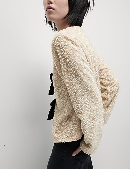 Blouse met V-hals en lovertjes