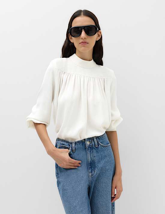 Blusa de manga blus&oacute;n con cuello alto