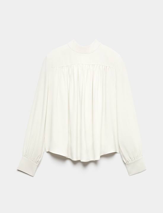 Blusa de manga blus&oacute;n con cuello alto