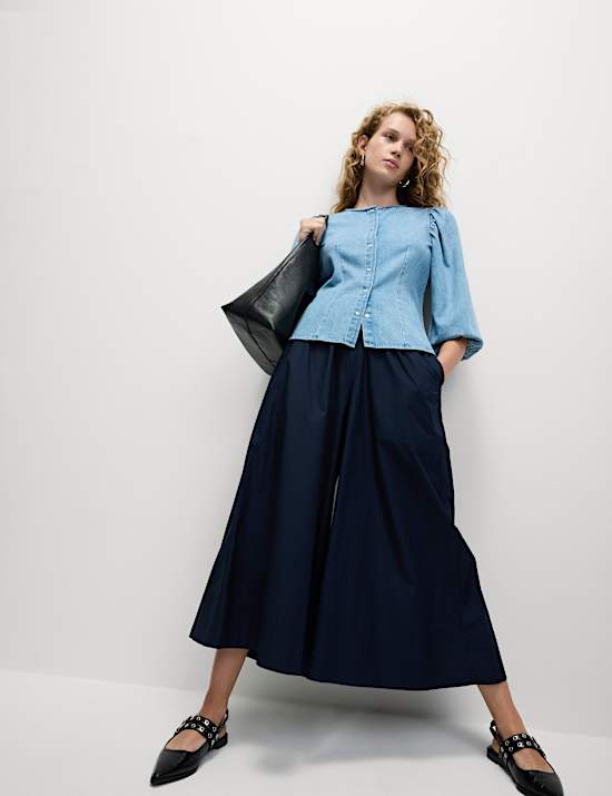 Denim blouse met knoopsluiting en pofmouwen