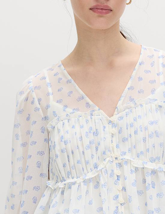 Blusa de manga larga de cuello en pico con volantes