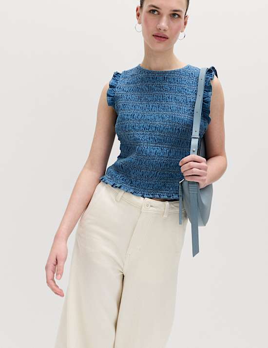 D&eacute;bardeur en jean fronc&eacute;