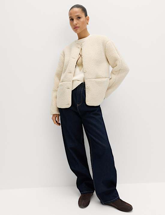 Fl&iacute;sov&aacute; bunda s umělou kože&scaron;inou