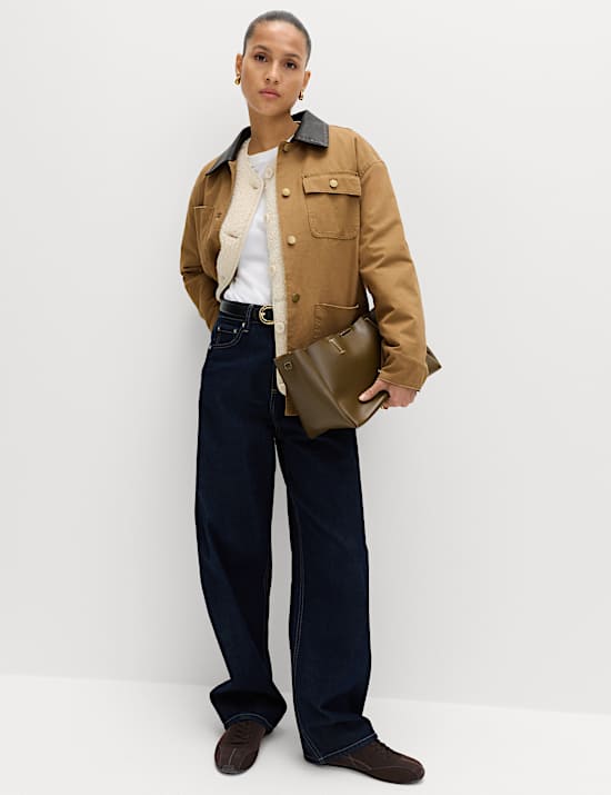 Fl&iacute;sov&aacute; bunda s umělou kože&scaron;inou