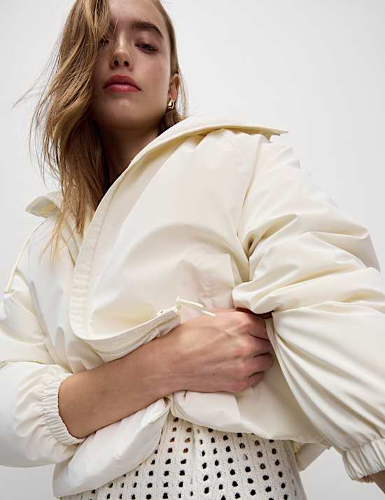 Wattierte kurze Regenjacke aus Gummi mit Stormwear™-Technologie
