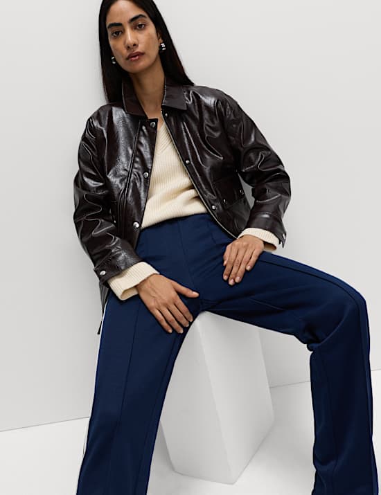 Veste longue en similicuir laqué