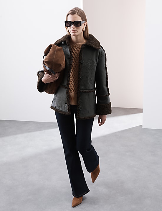 Veste en cuir textur&eacute; avec doublure imitation peau de mouton