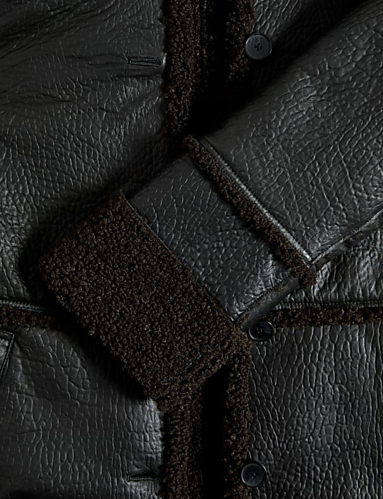 Veste en cuir textur&eacute; avec doublure imitation peau de mouton