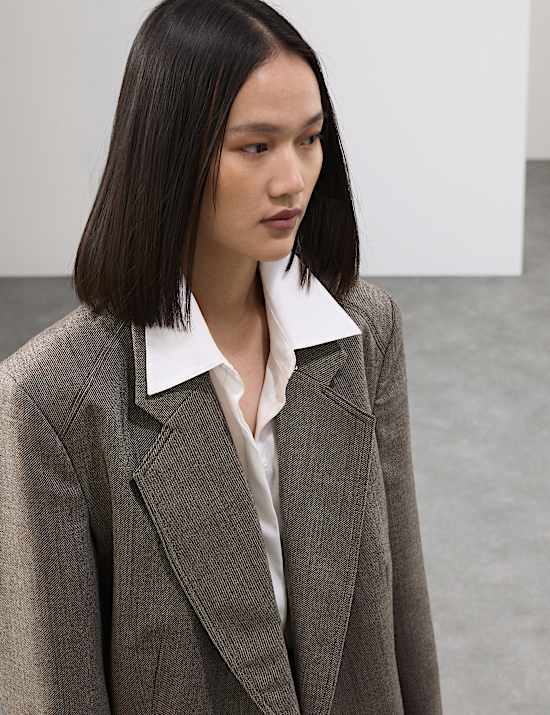 Ruimvallende blazer van zuivere wol