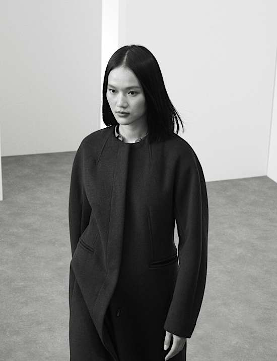 Kraagloze, lange jas van wolmix