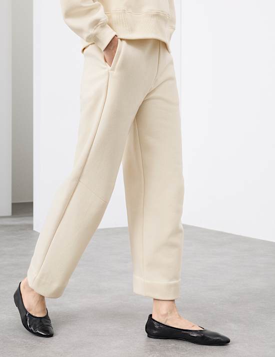 Přiléhavé tepláky s česanou úpravou na kotnících