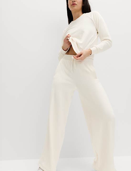 Velours joggingbroek met hoge taille en wijde pijpen